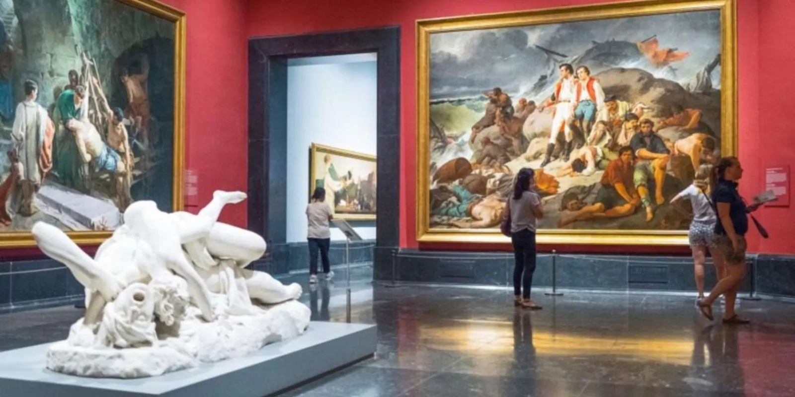 Paintings and sculpture in a Prado gallery