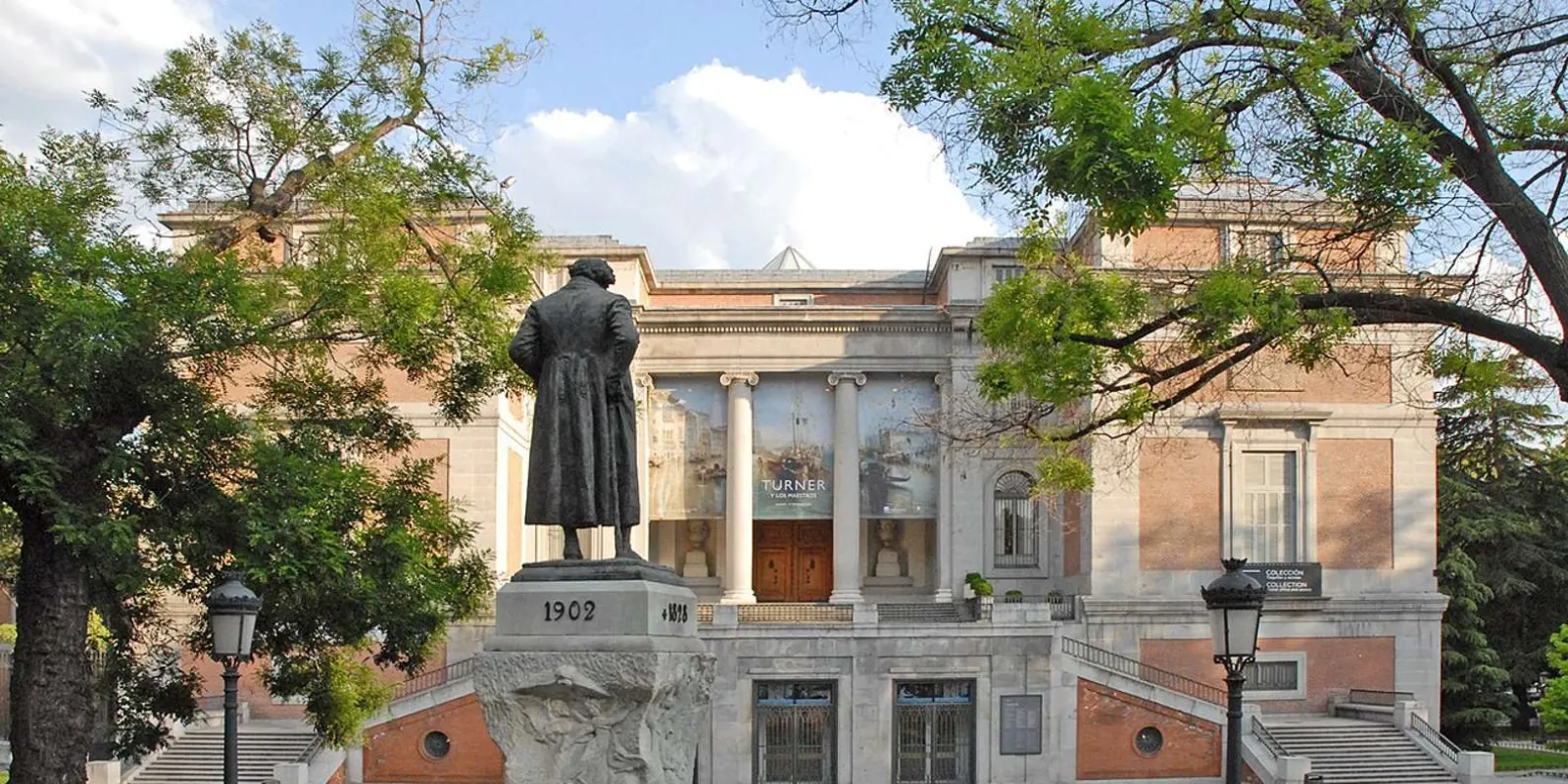 Prado entrance framed by trees